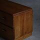 Mid-20th century Art Deco chest of drawers in pine with metal handles, 1940s.