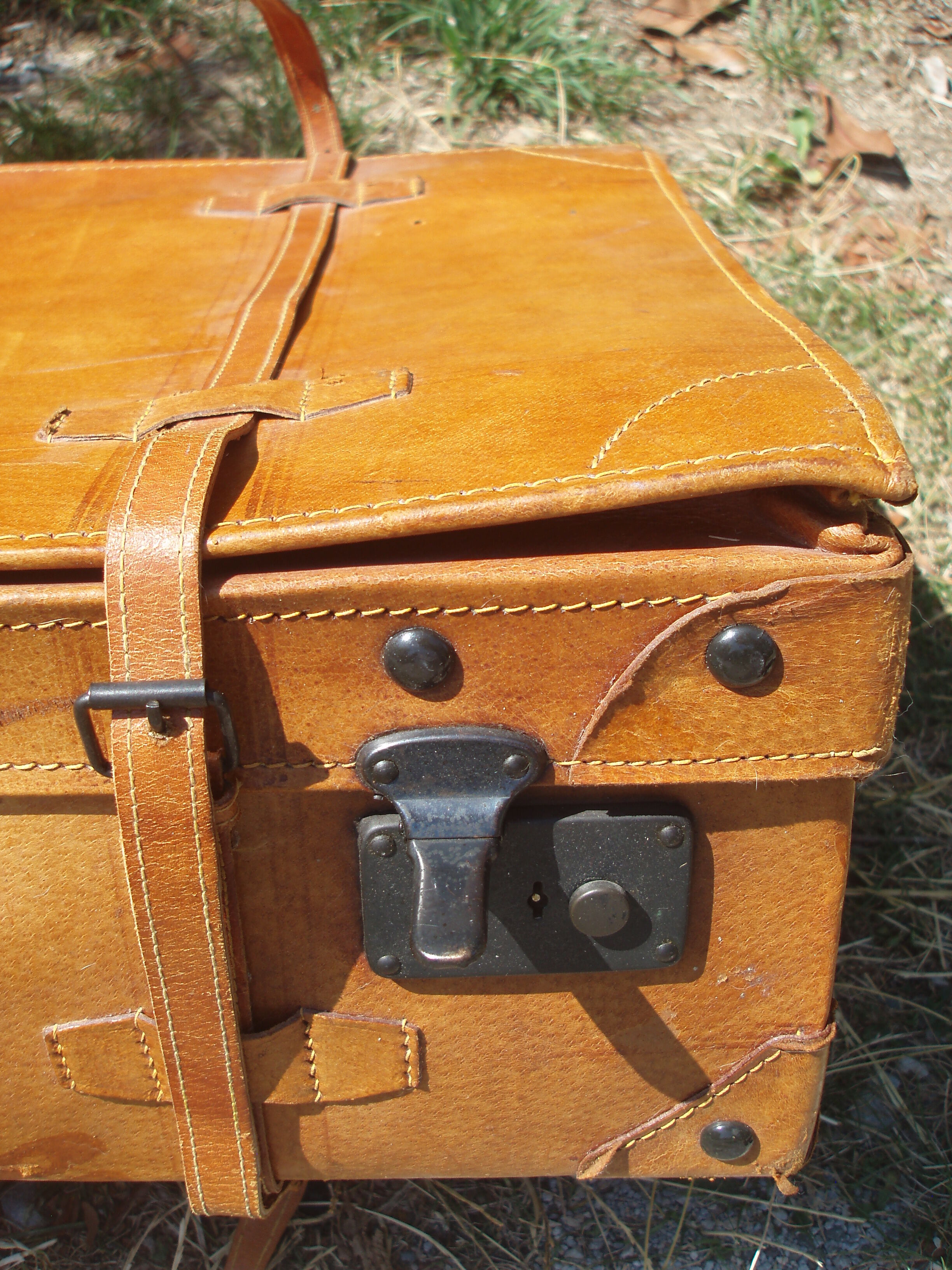 Old quality brown leather suitcase from the 60s