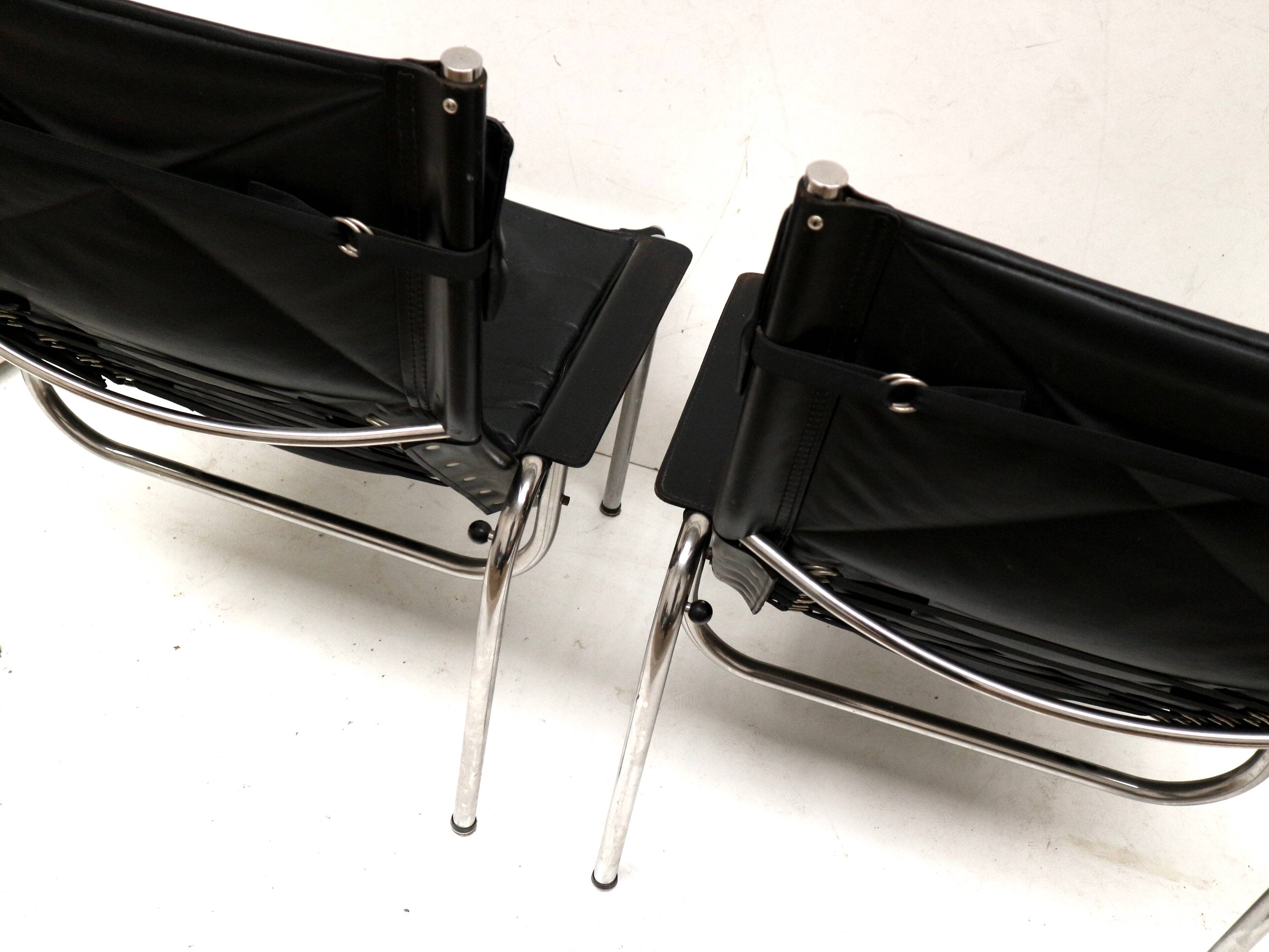 2x Vintage black leather armchair by Strässle HE1106 designed by Hans Eichenberger