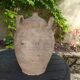 Ancient sandstone jar with two handles