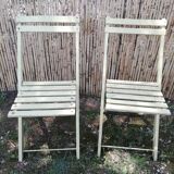 Two folding garden chairs