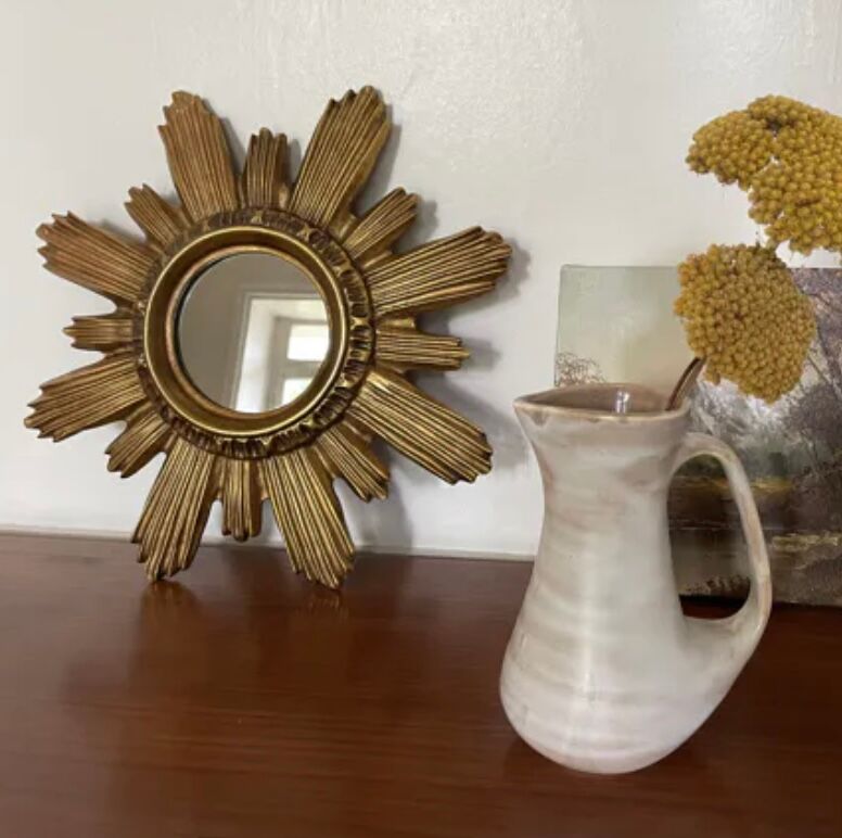 Vintage sun mirror in golden resin 60s/70s