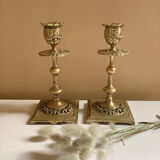 Pair of candlesticks in gilded bronze