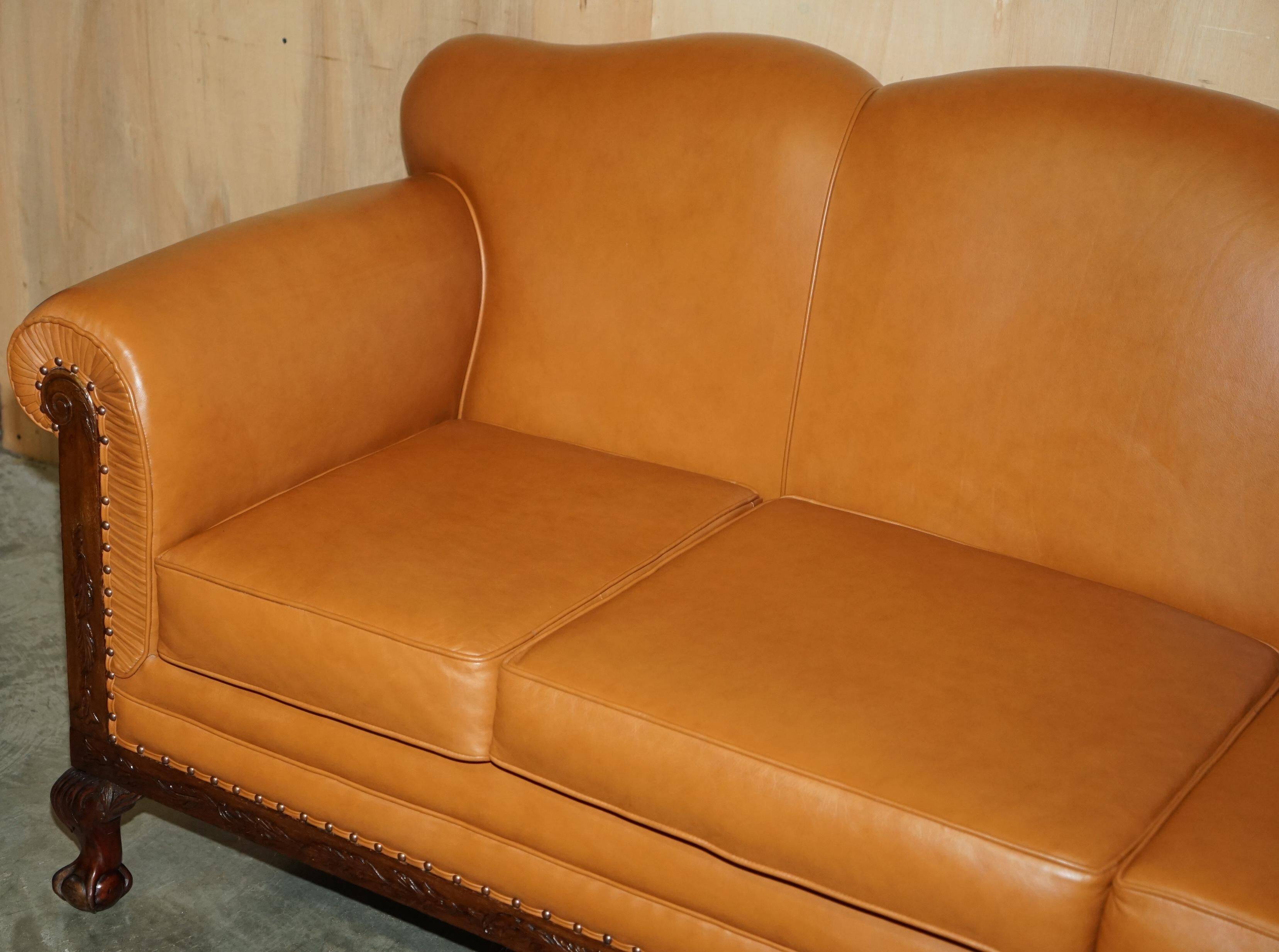 Restored three-seater leather canapé in late Victorian style.