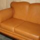 Restored three-seater leather canapé in late Victorian style.