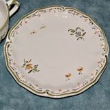 Two MOUSTIER cups decorated with flowers signed