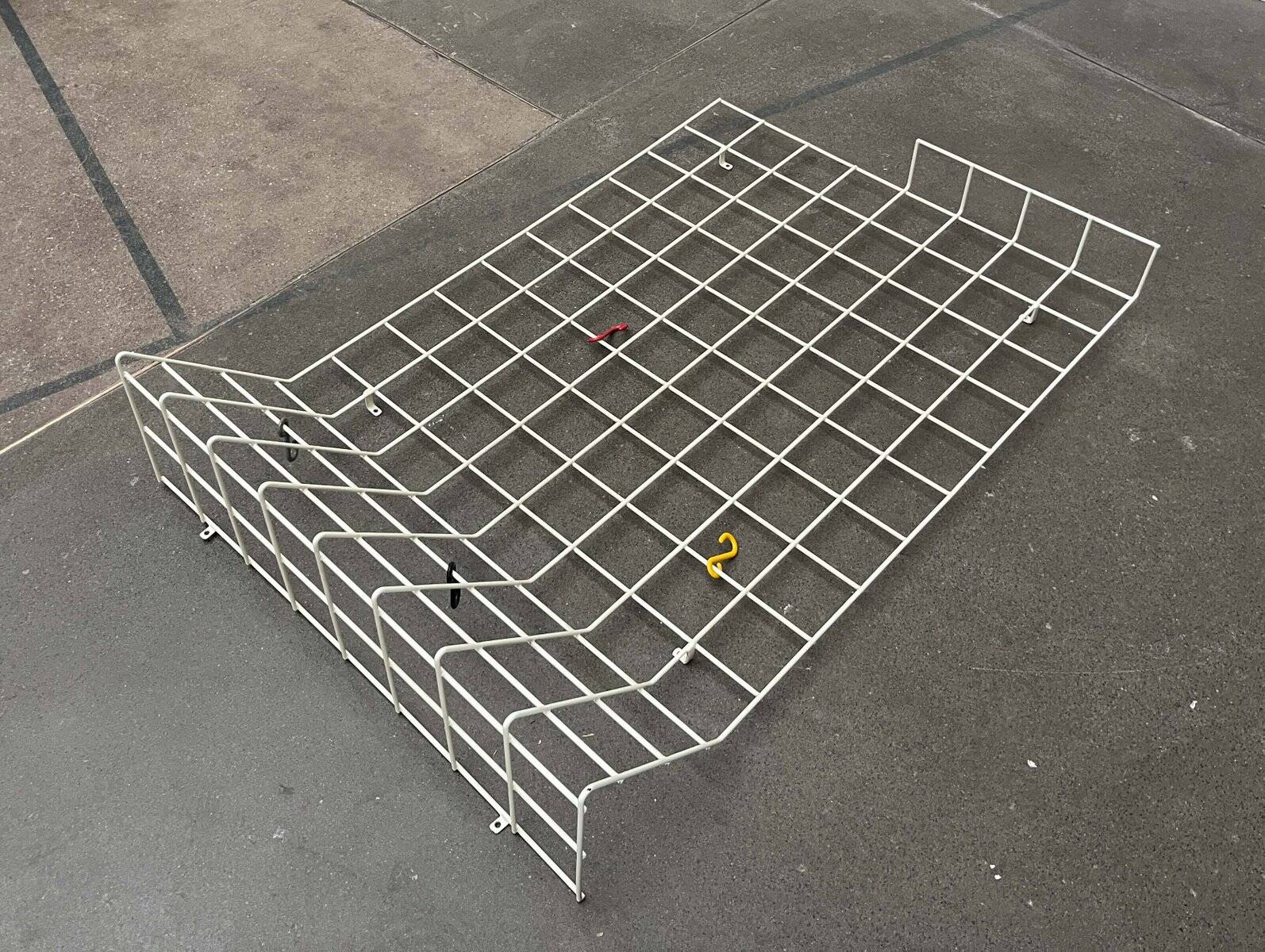 Minimalist white wire coat rack from mid-century Germany, 1960s.