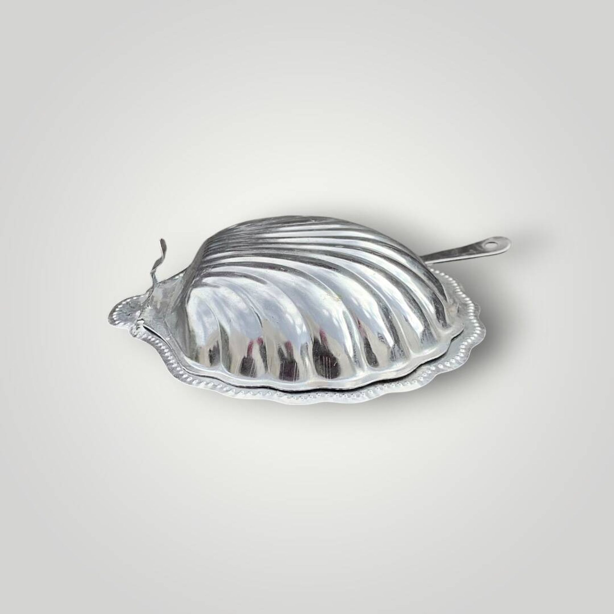 Vintage shell butter dish in stainless steel and cobalt blue glass with knife