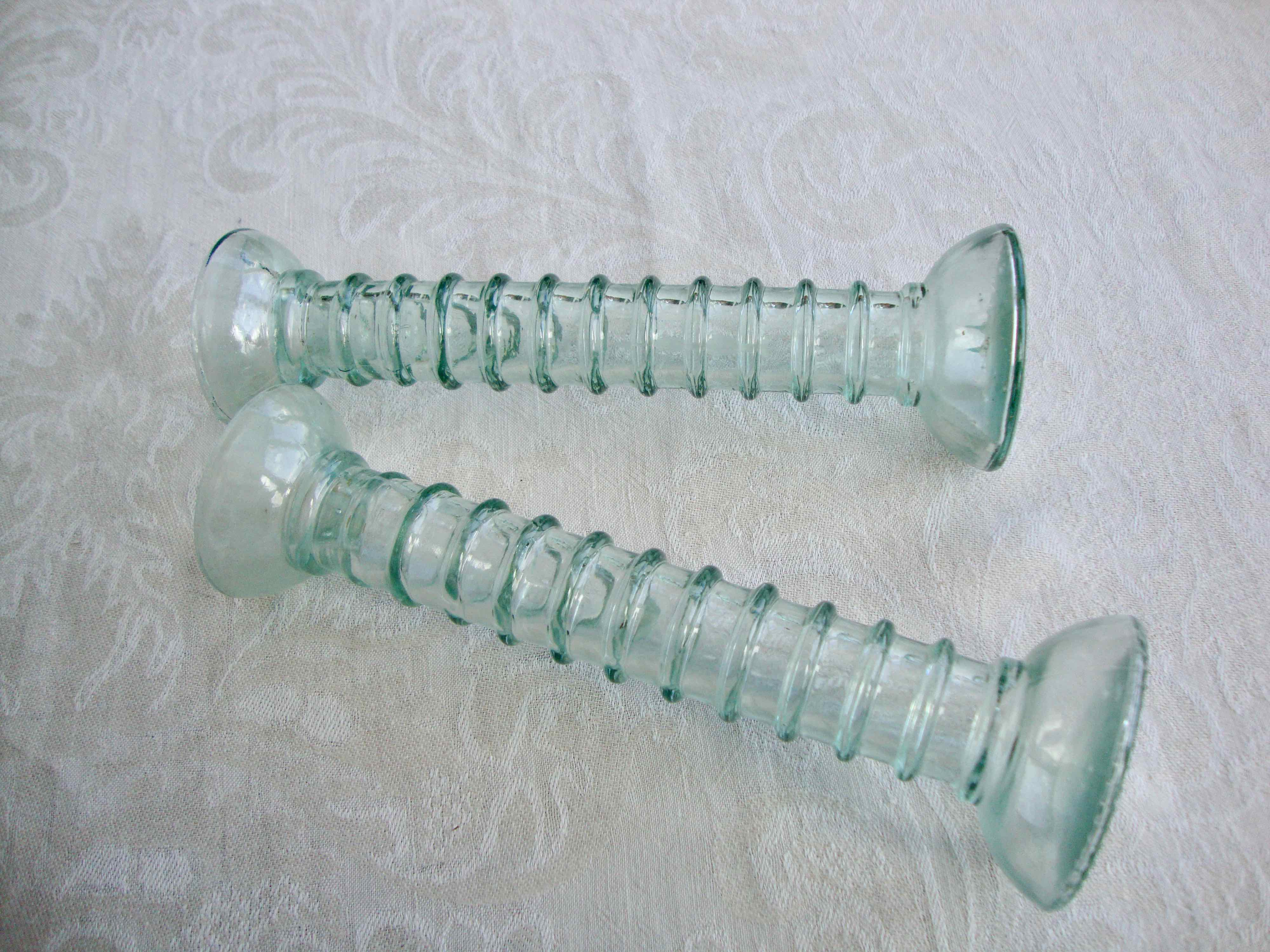 2 twisted glass candle holders