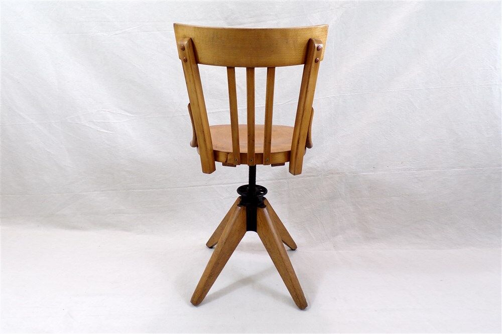 Swivel chair stamped baumann