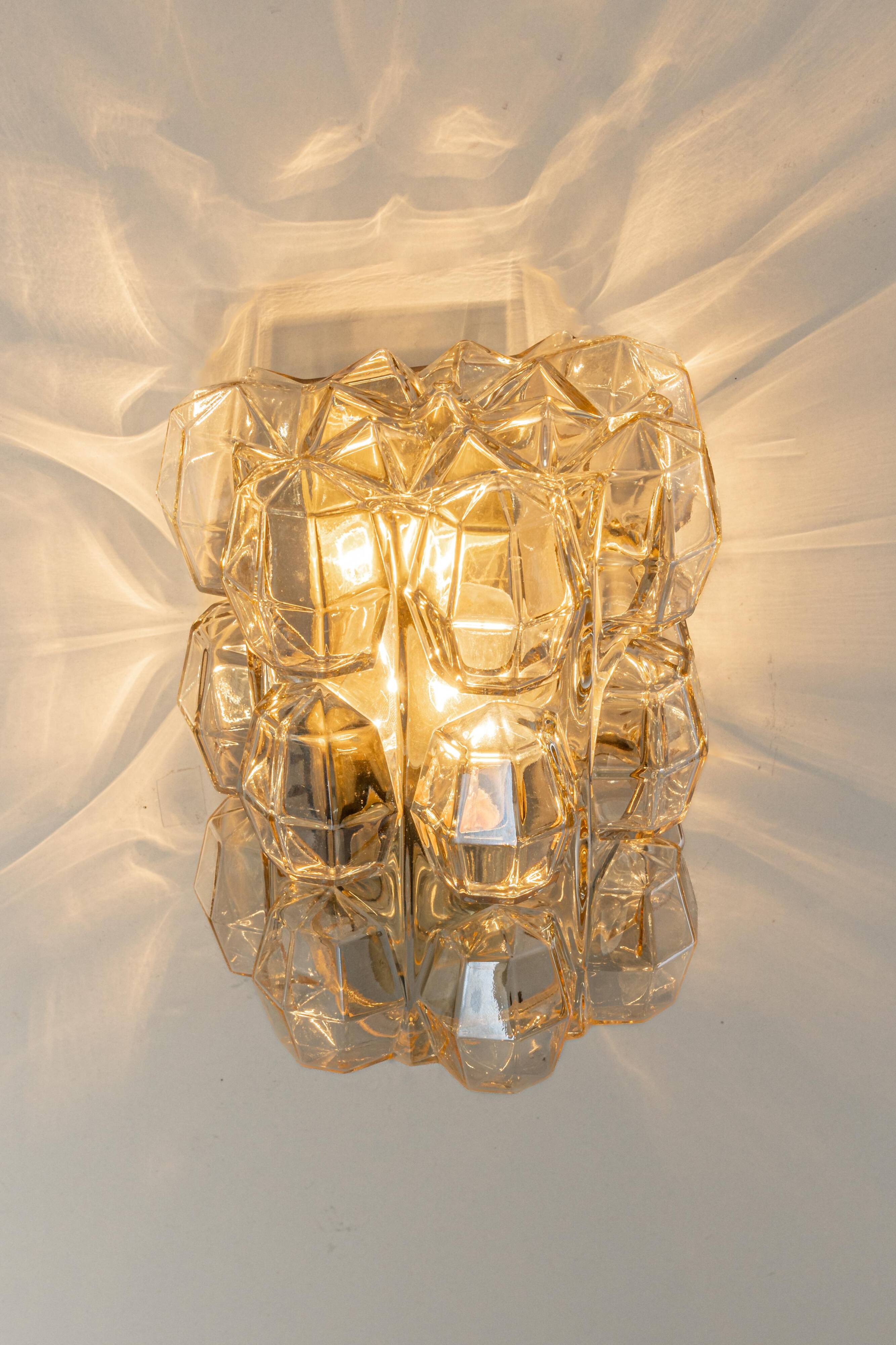 Large amber wall lamp in bubble glass by Helena Tynell, Limburg, Germany.