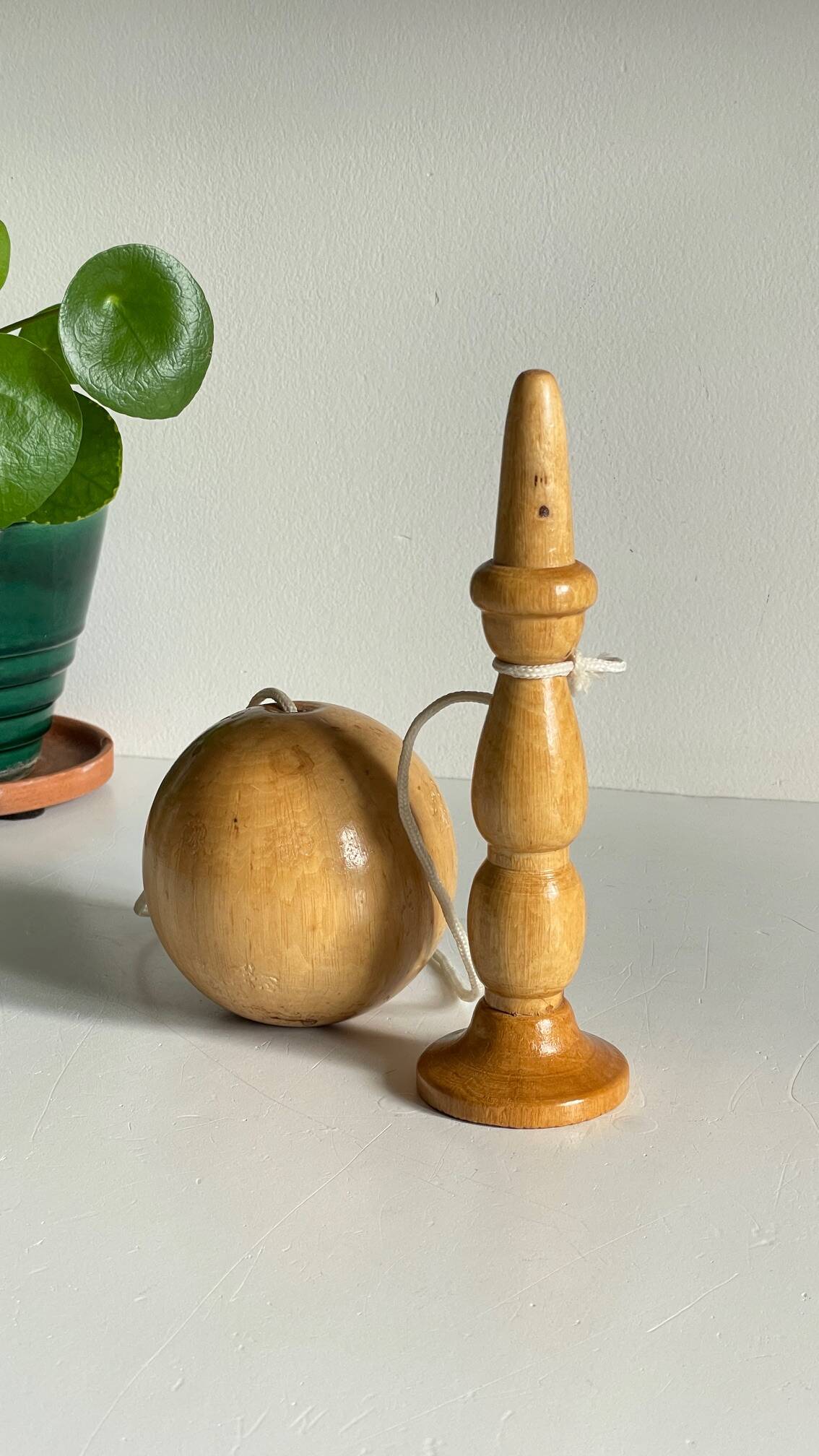 Vintage wooden cup-and-ball toy