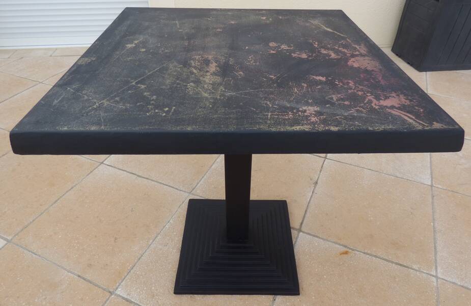 Vintage professional bistro table and its cast iron base