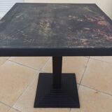 Vintage professional bistro table and its cast iron base