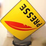 "Press" sign