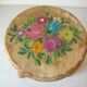 Old tripod stool with 3 wooden legs, painted floral decoration, flower bouquet