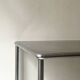 Dining table / tubular and modernist desk in chrome metal