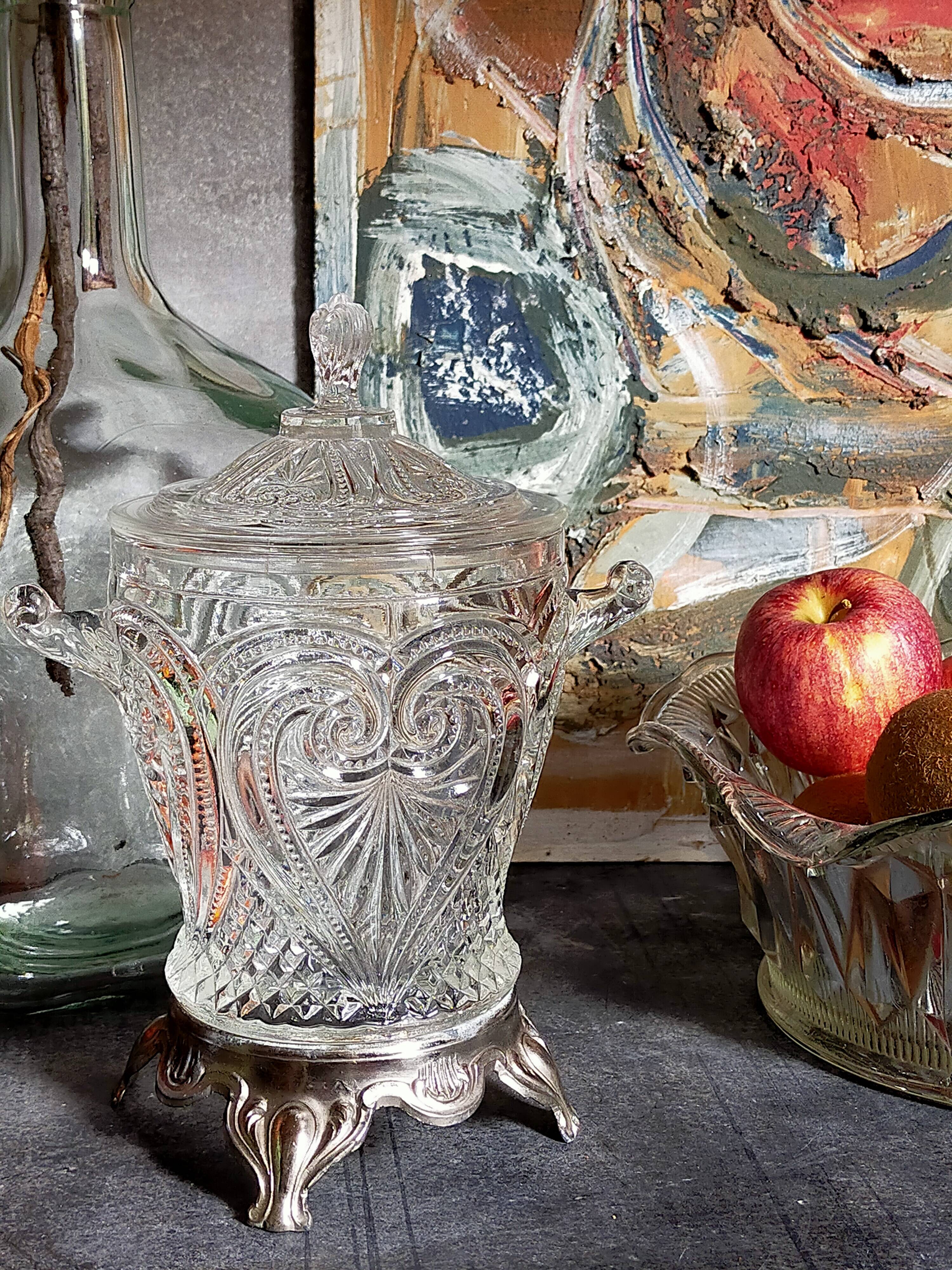 Antique glass compotier on metal stand