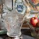 Antique glass compotier on metal stand