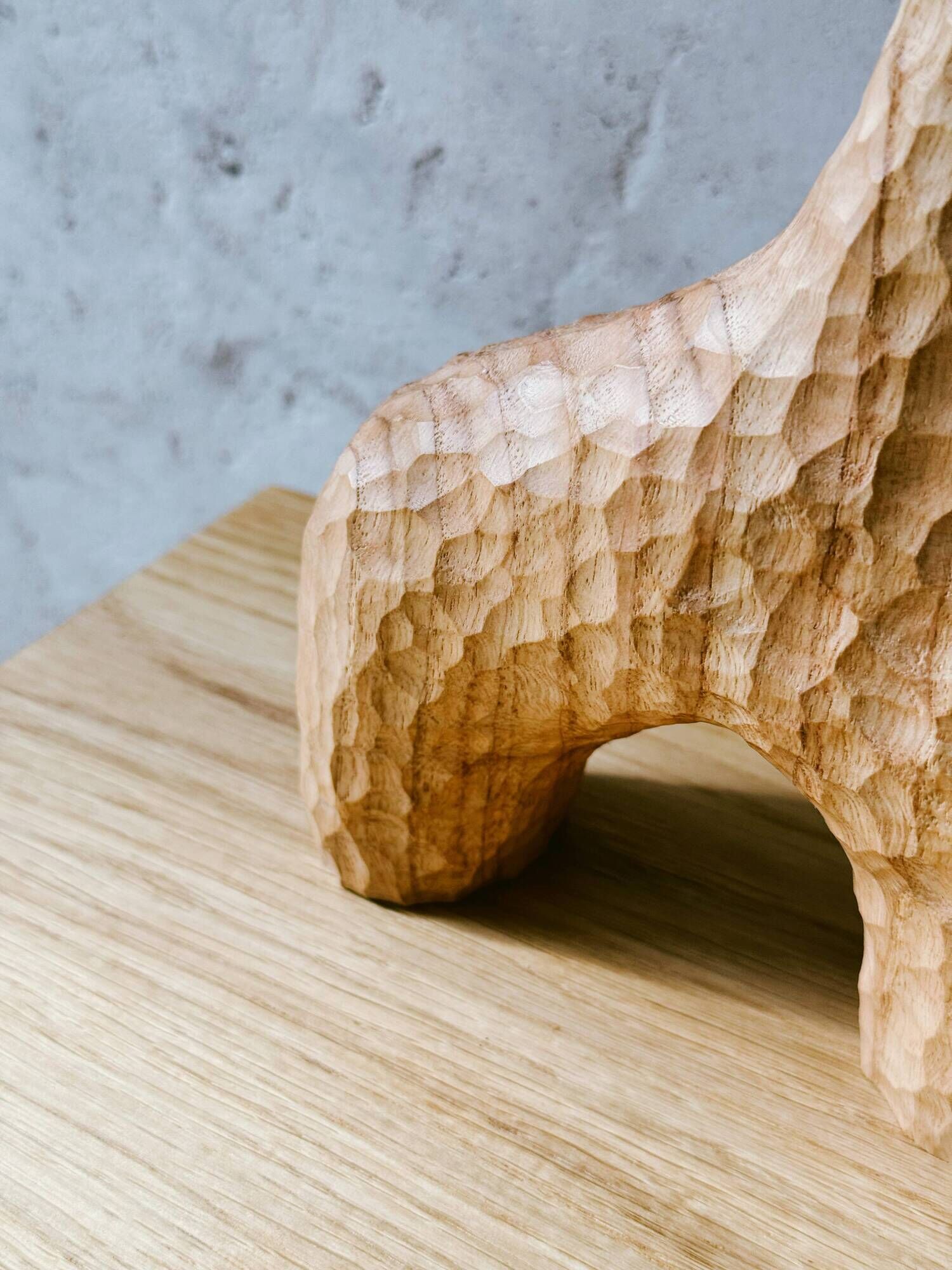 Hand-carved soliflore vase in solid chestnut wood.
