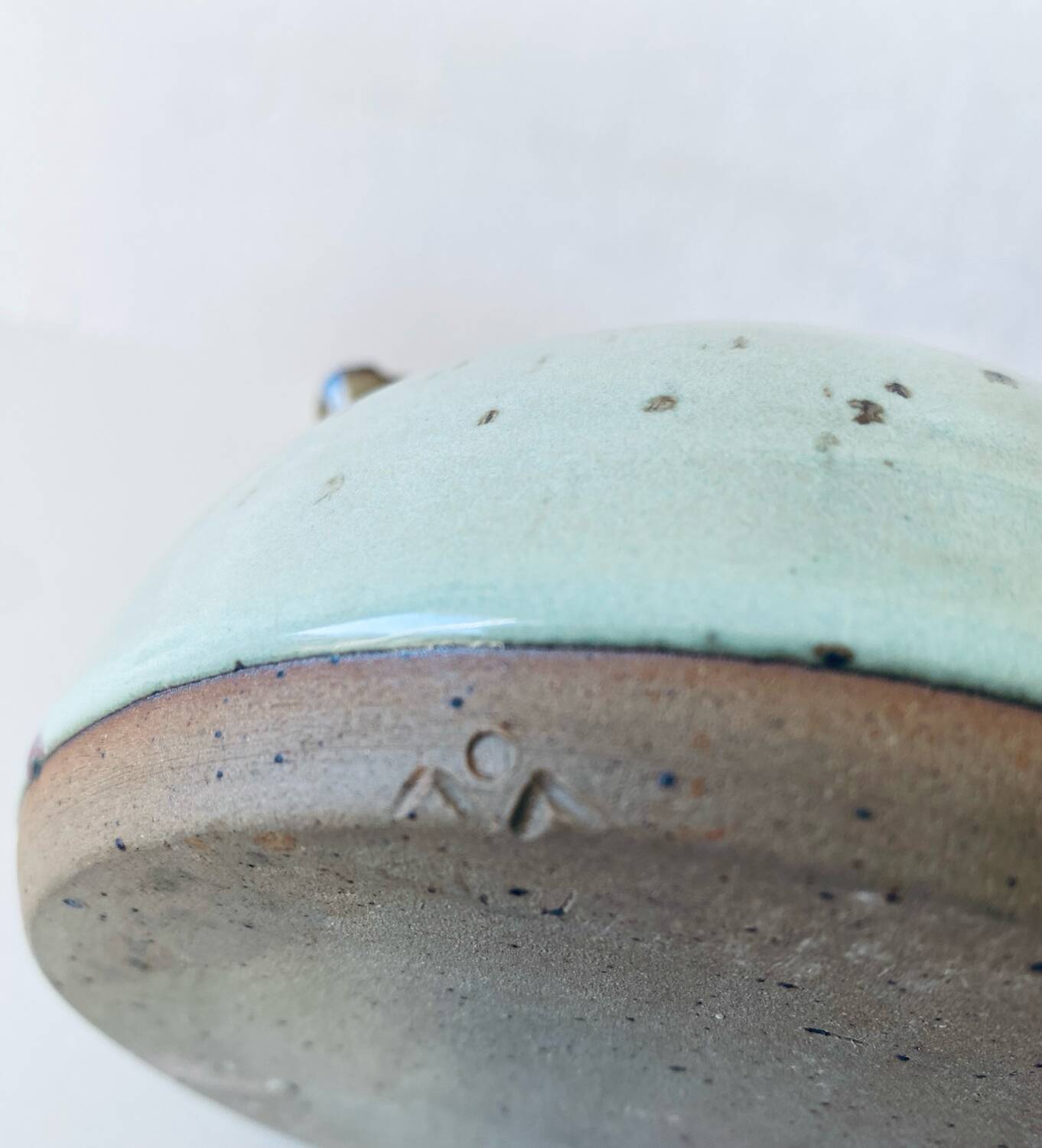 Signed stoneware flower vase