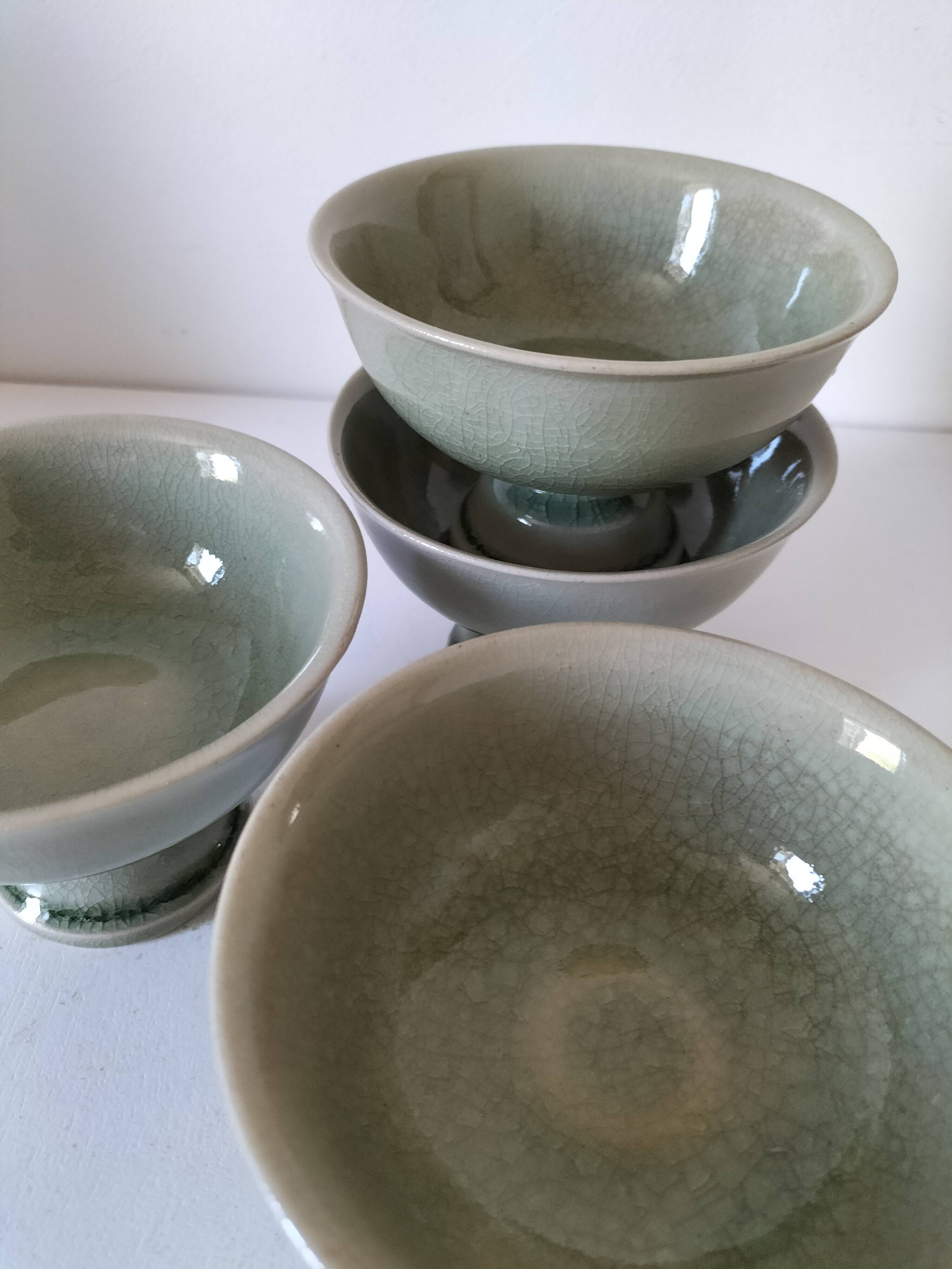 Set of 4 handmade ceramic bowls – celadon glaze & raku style