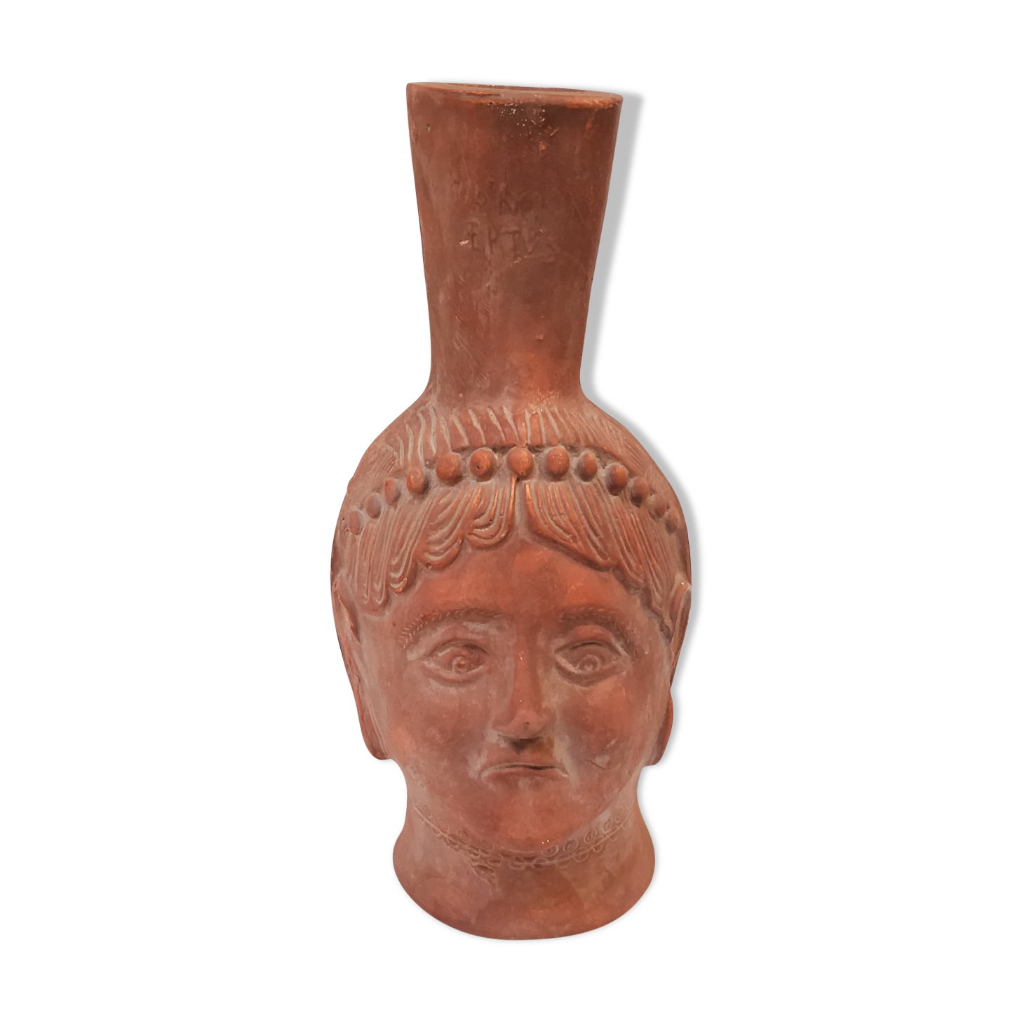 Jug vase with human head