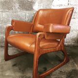 Armchair called "sled" Publisher Baumann and Ottoman