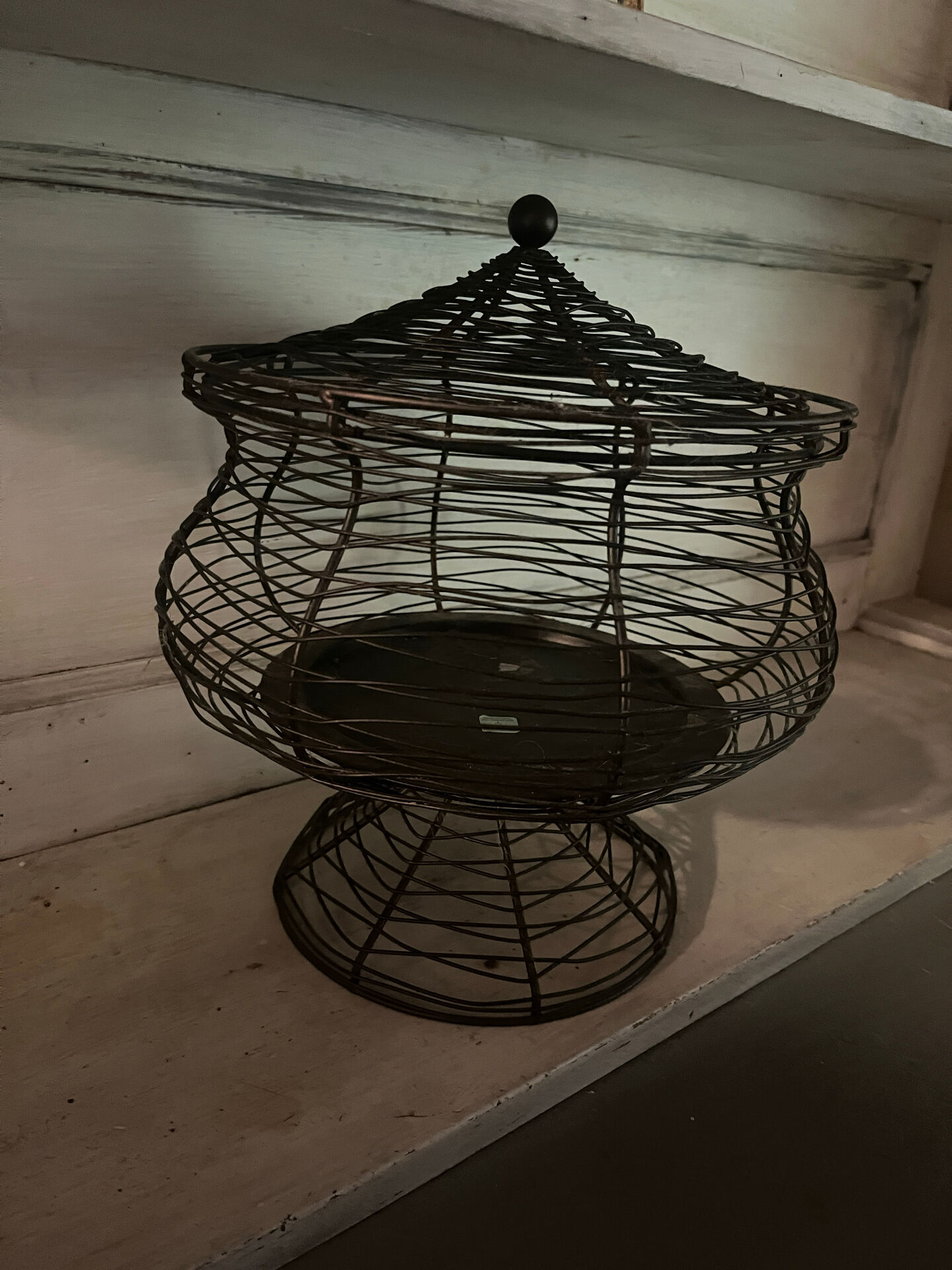 Wrought iron candle holder