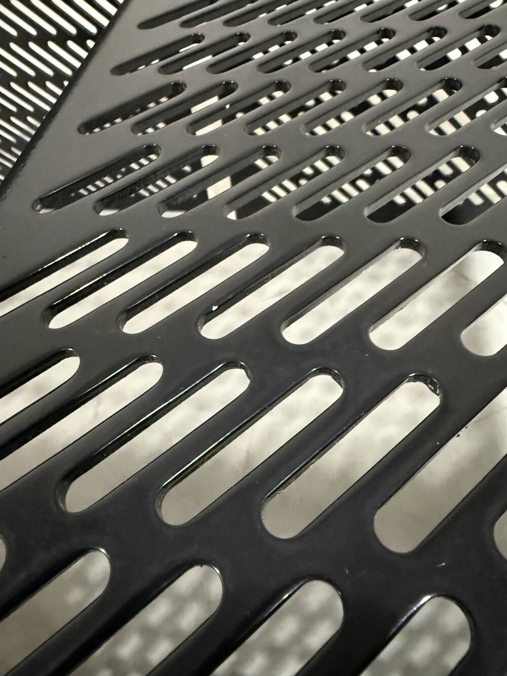 Black perforated steel nesting tables Italy 1980’s