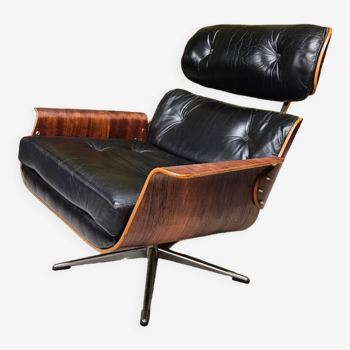 Lounge armchair black leather 1970 vintage