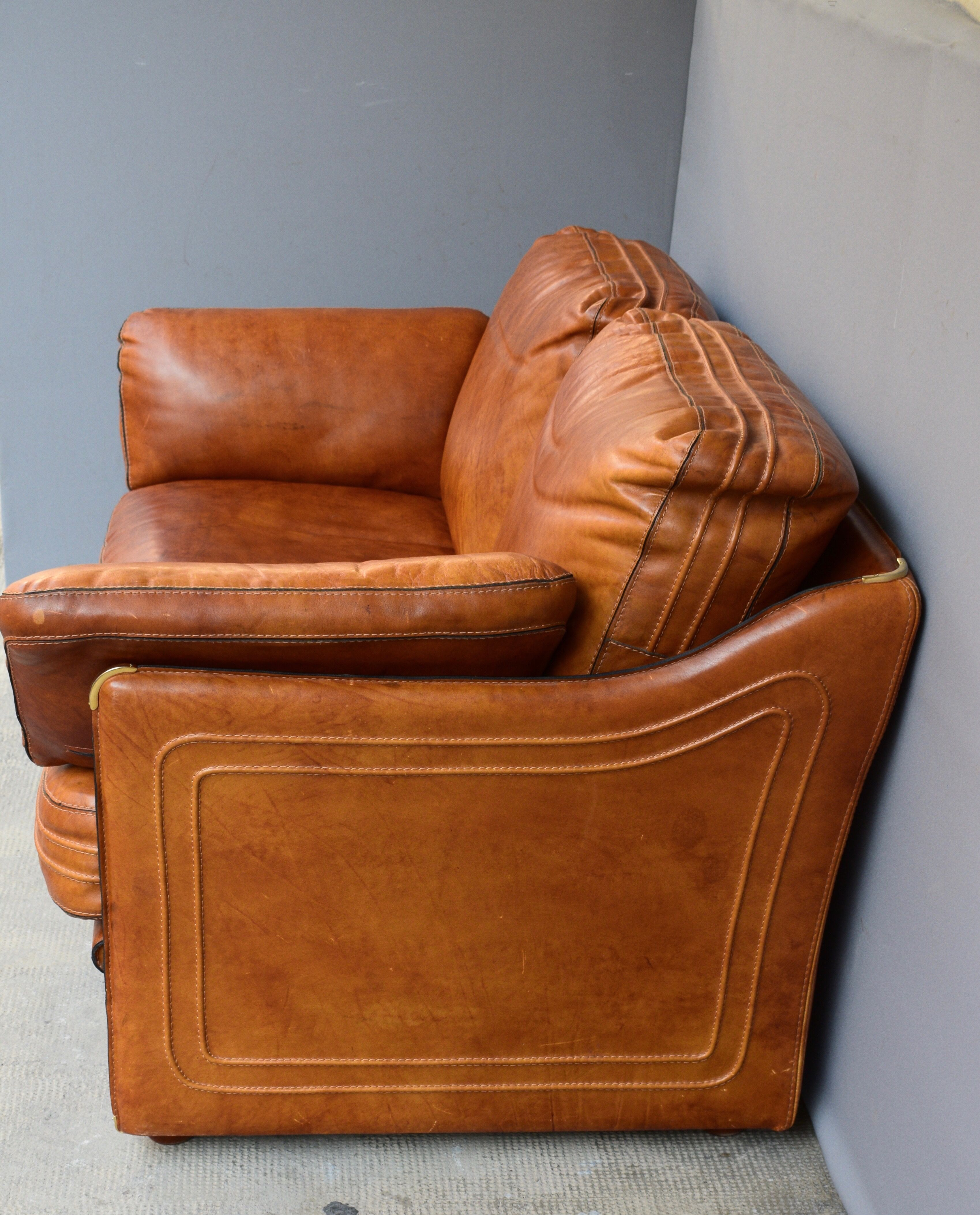 Vintage two-seater leather sofa