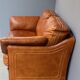 Vintage two-seater leather sofa
