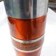Vase en métal orange et gris