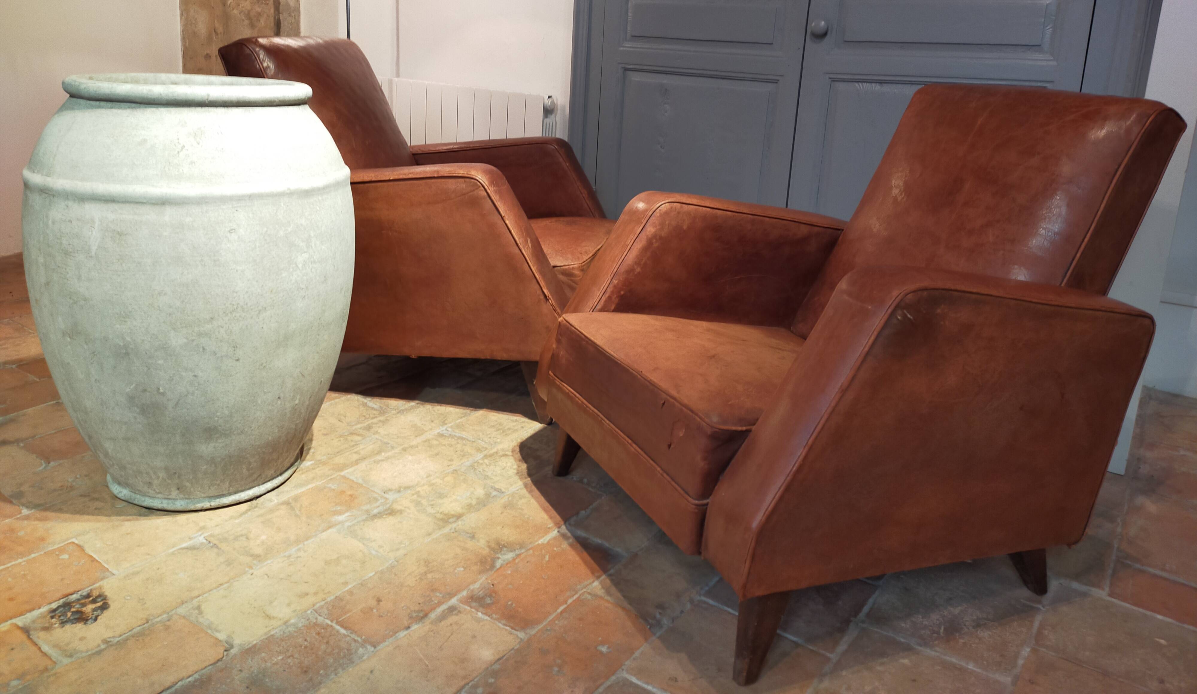 Paire de fauteuils cuir
