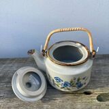 Chinese ceramic and rattan teapot
