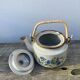 Chinese ceramic and rattan teapot