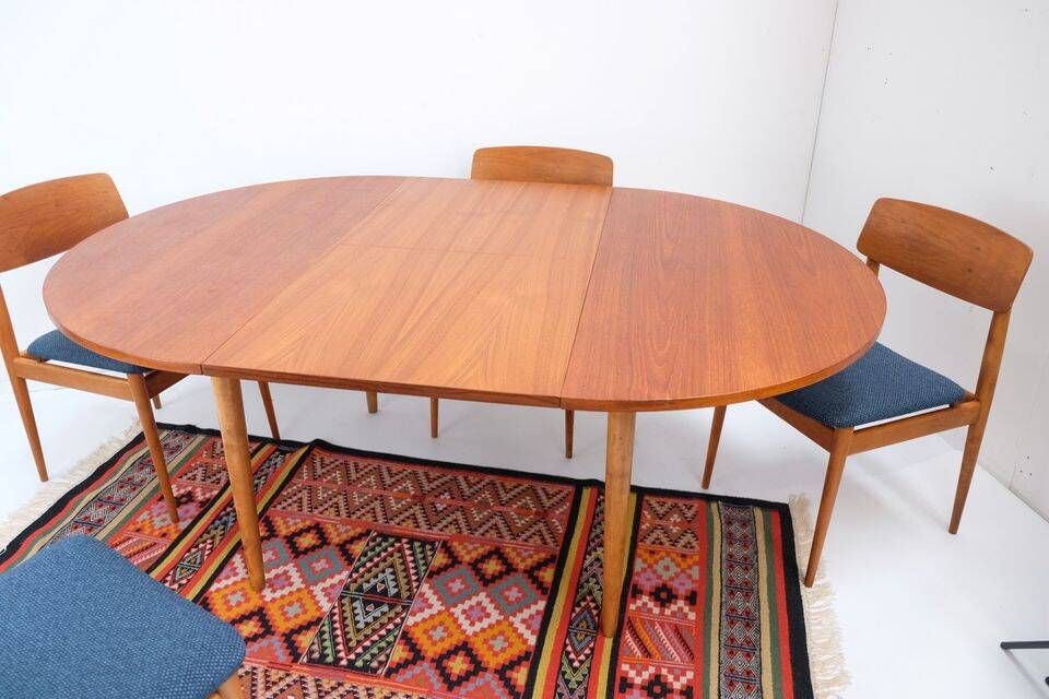 1960s/70s-style teak dining table by ASKO, with a retro vintage design.