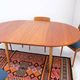1960s/70s-style teak dining table by ASKO, with a retro vintage design.