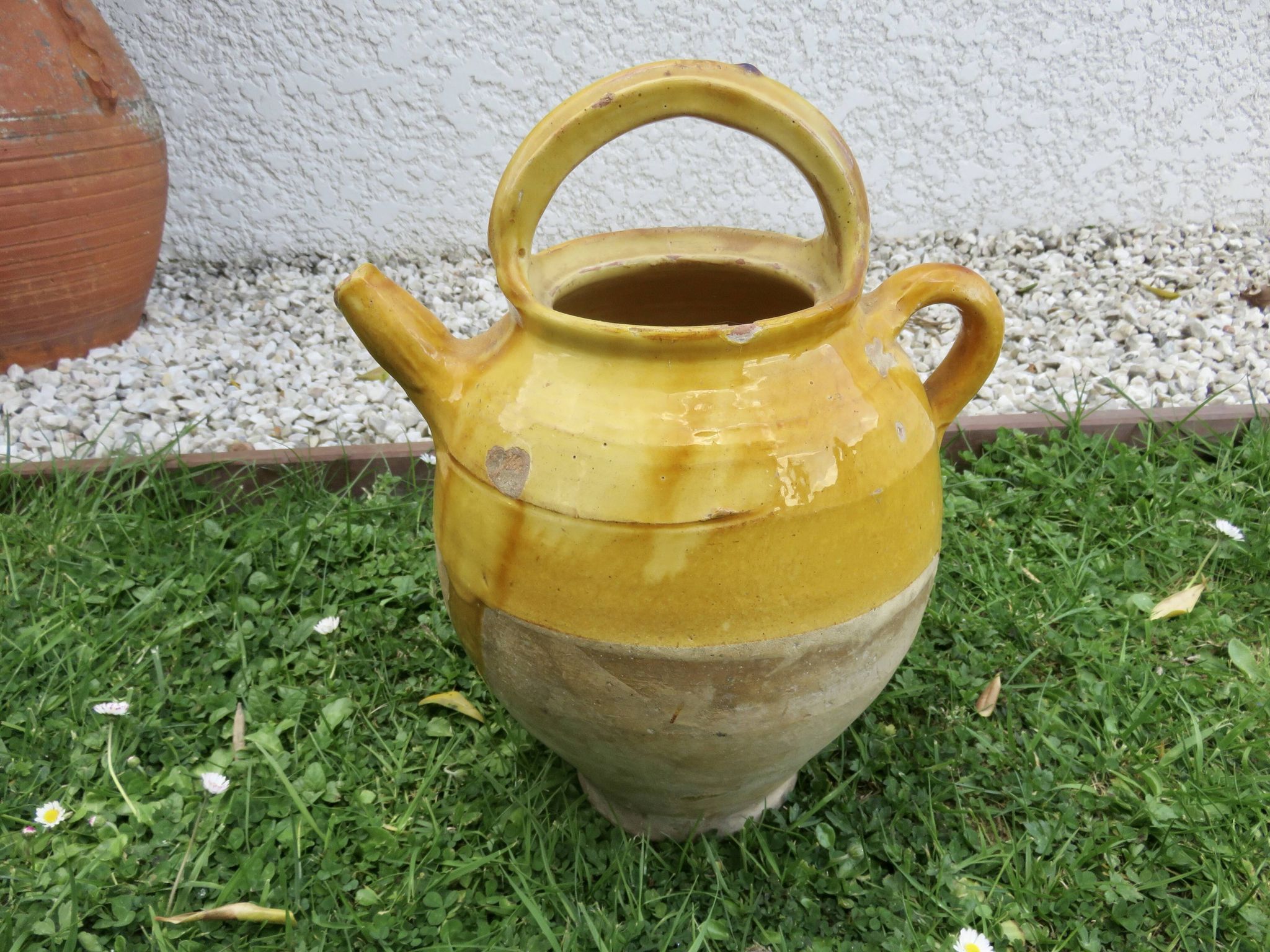 Yellow glazed terracotta jar, south-west of France.