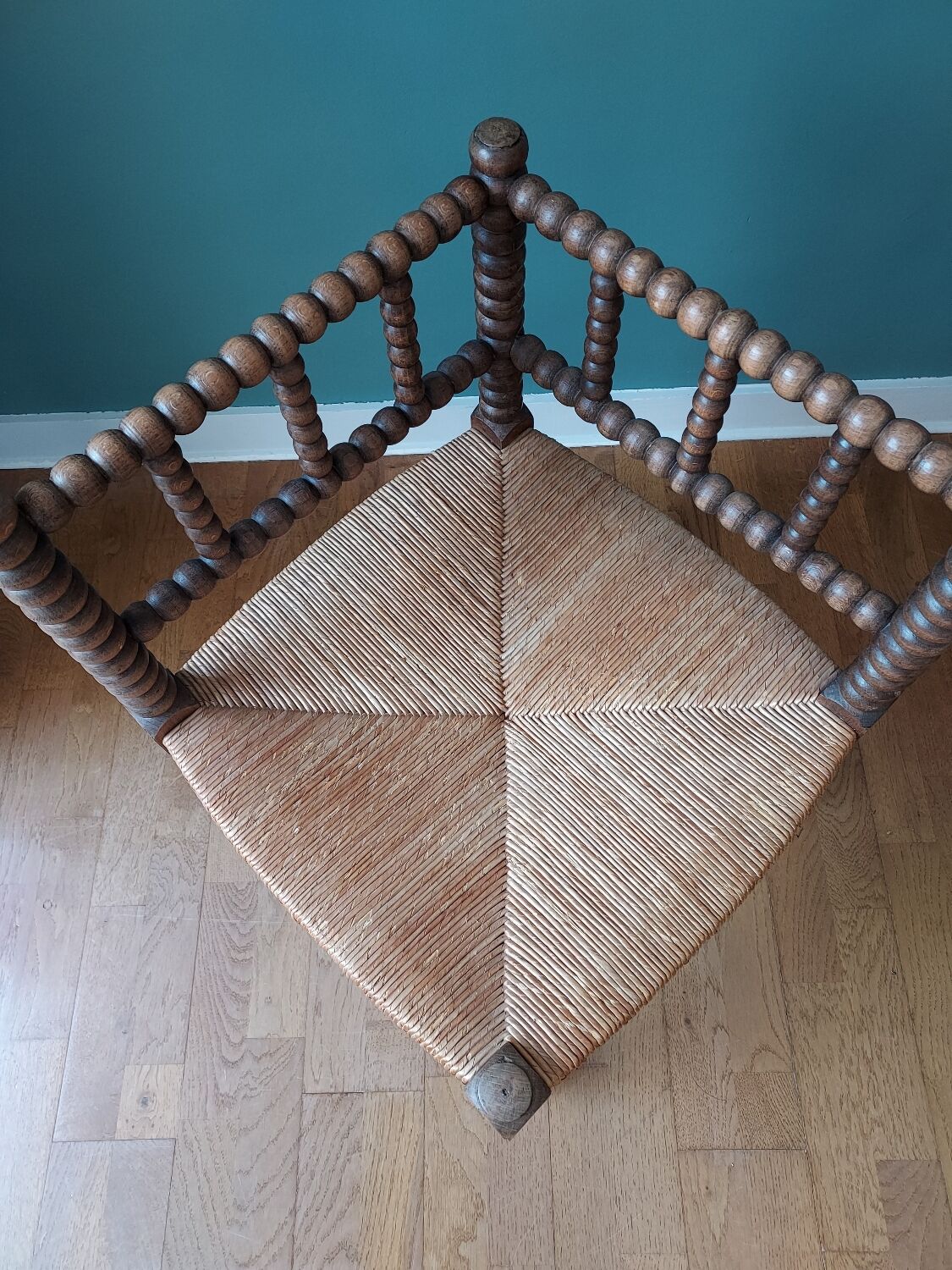 Corner armchair in turned wood