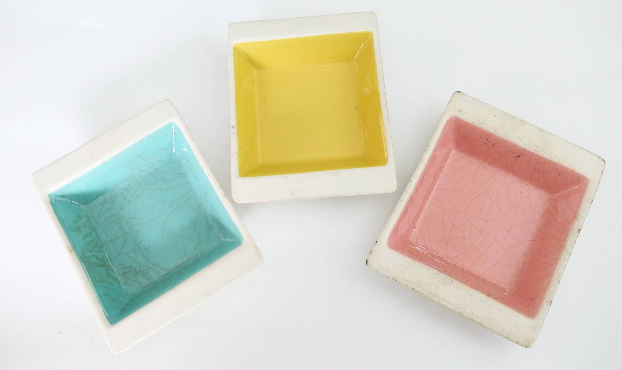 Set of three German ceramic catchalls from the 1950s.