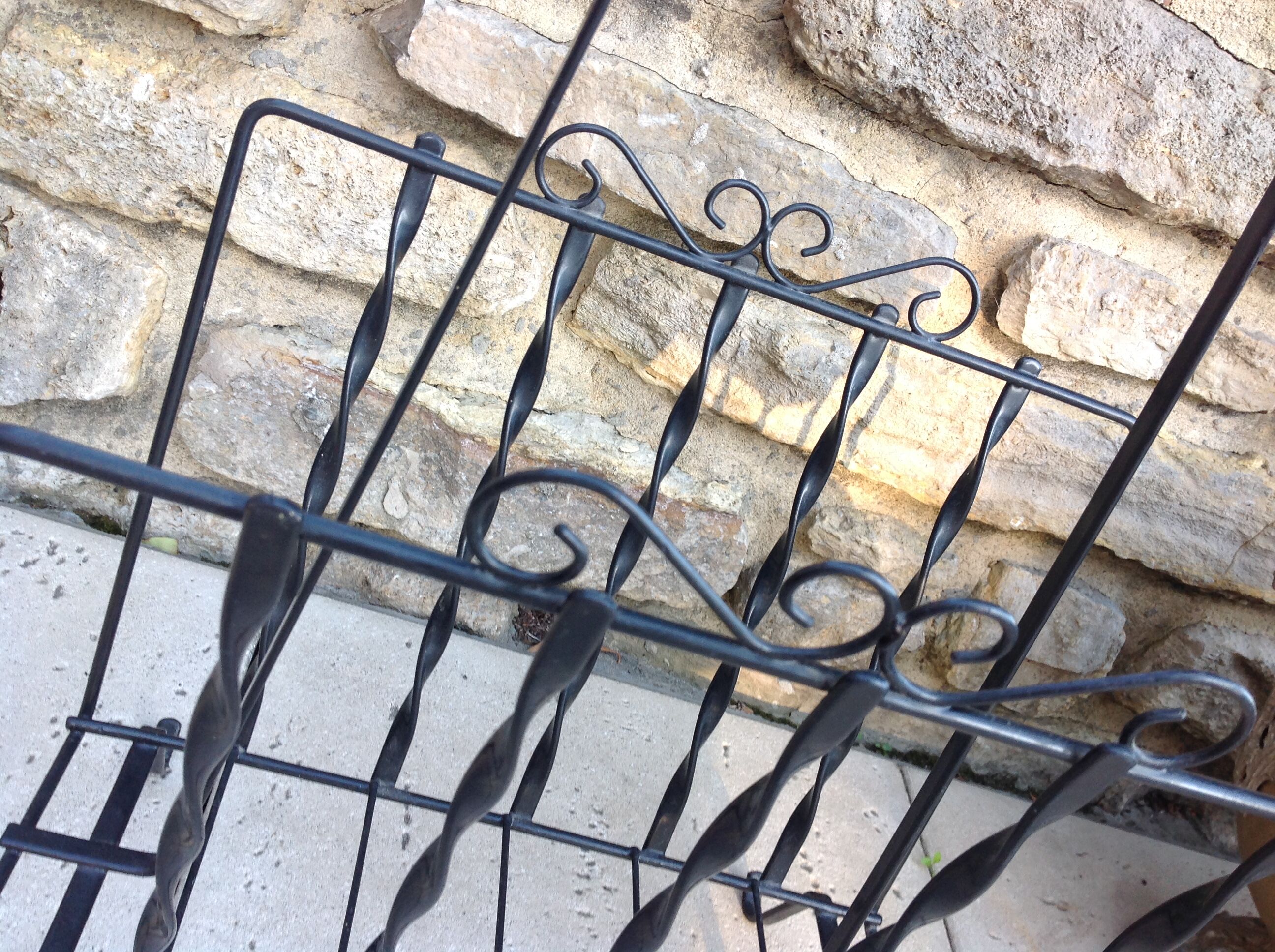 Black metal magazine holder