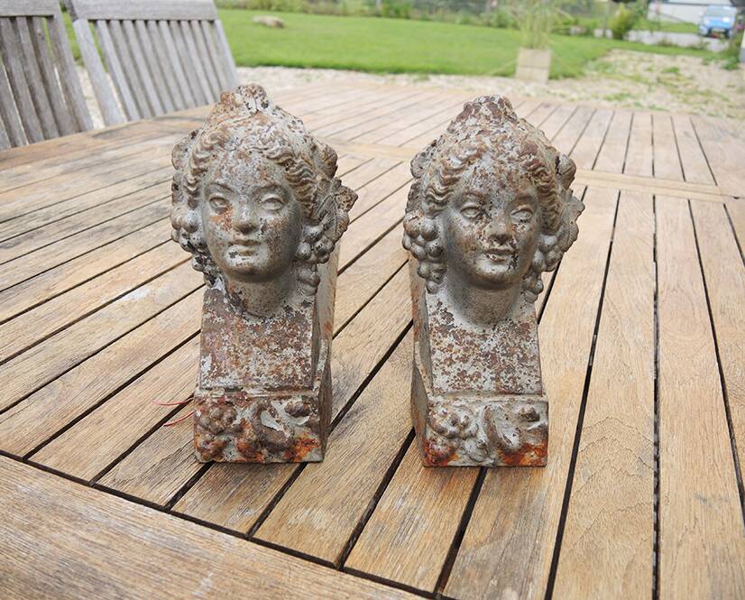 Old women's cast iron chenets with buckles