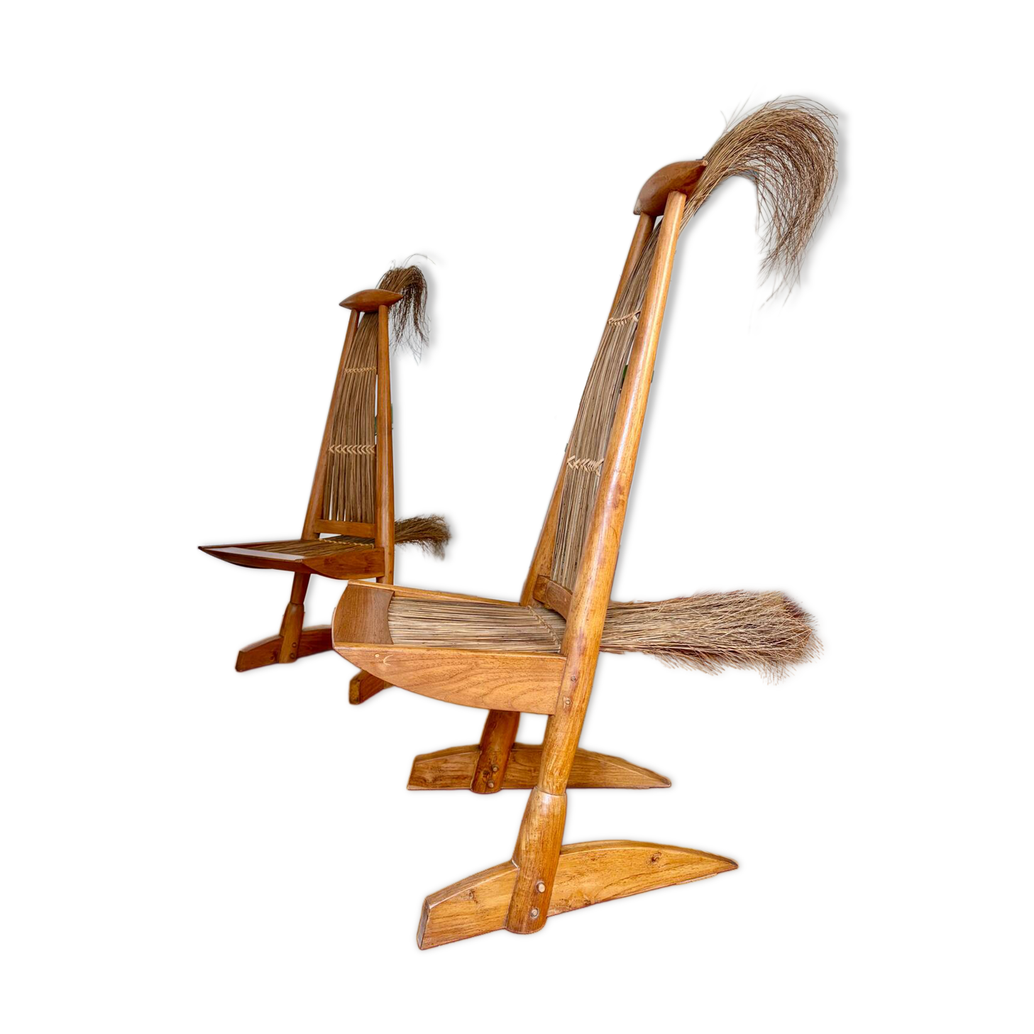 Pair of sculptural chairs in teak and rattan, Bali, 1990s