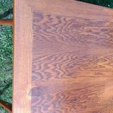 Vintage oak table with tapered legs.