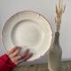 12 white old flat plates with brown fillet