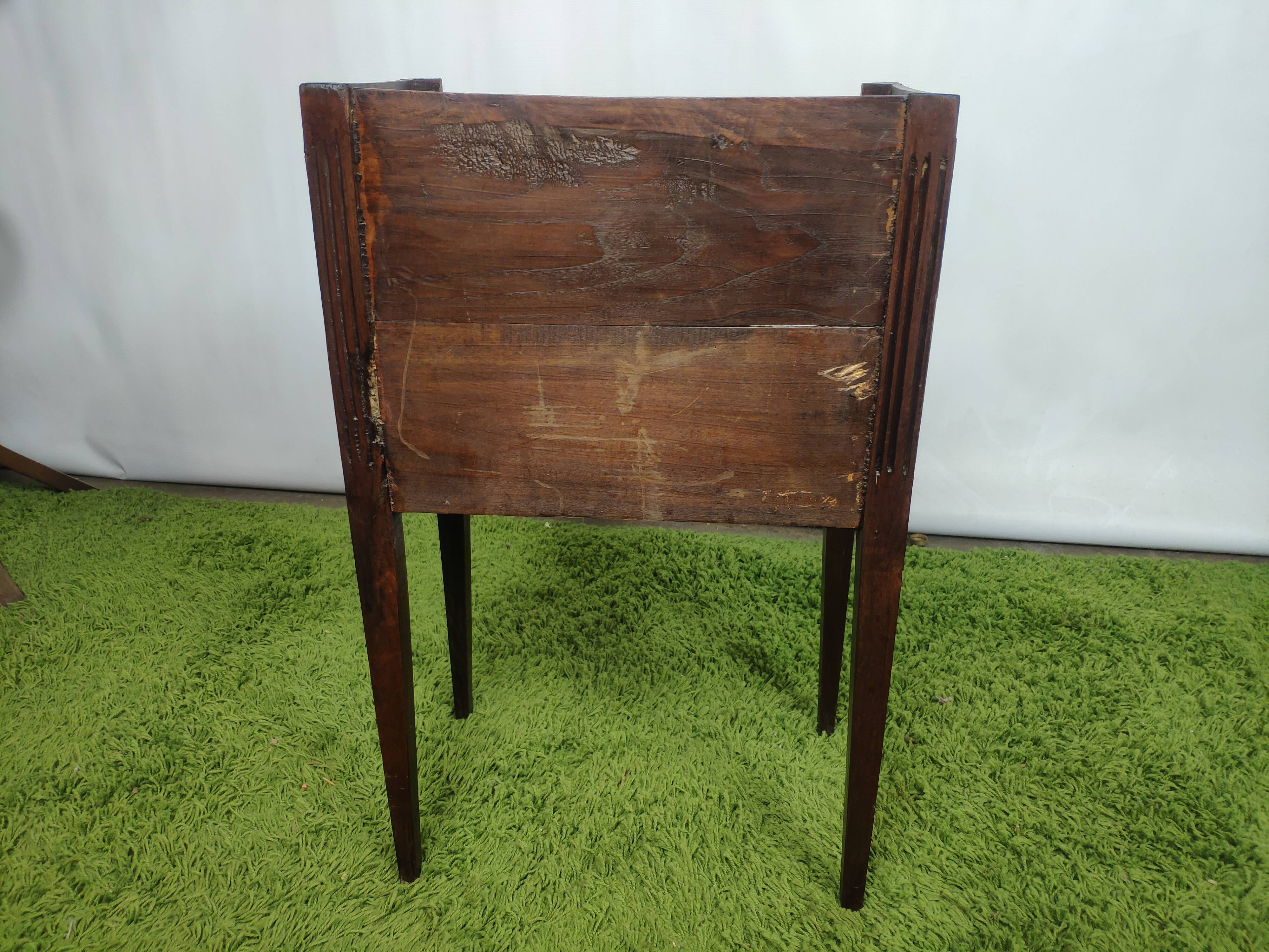 Old wooden bedside table