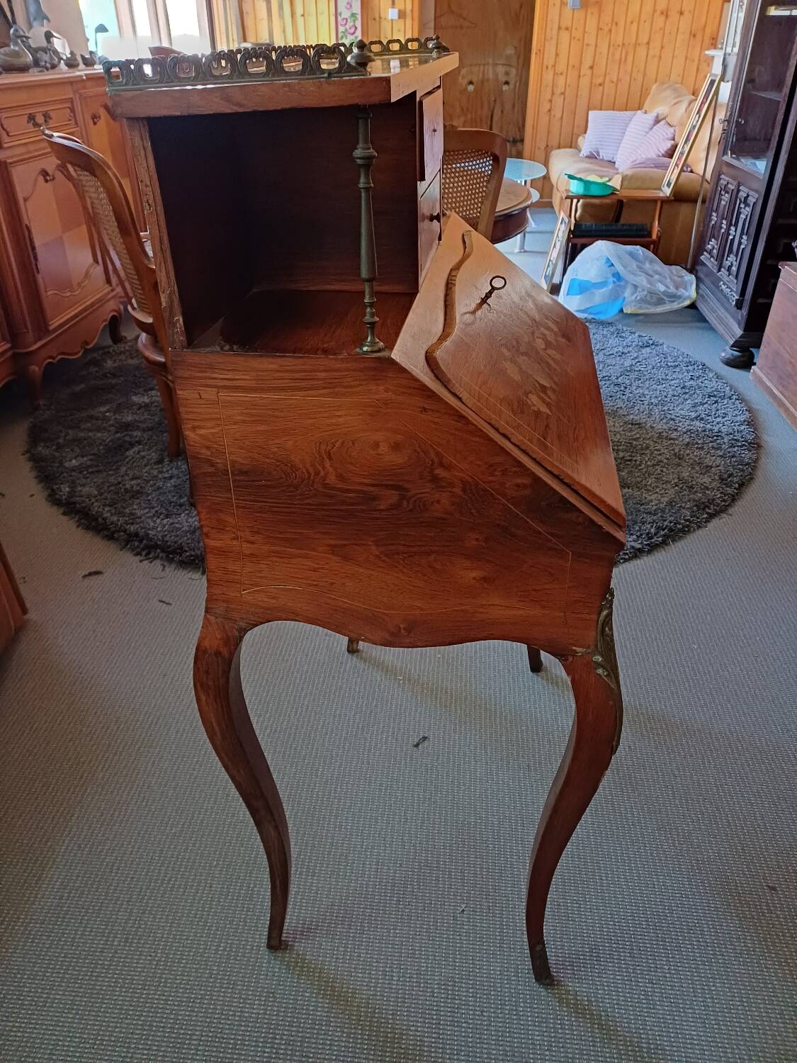 Brown mahogany secretary desk with marquetry