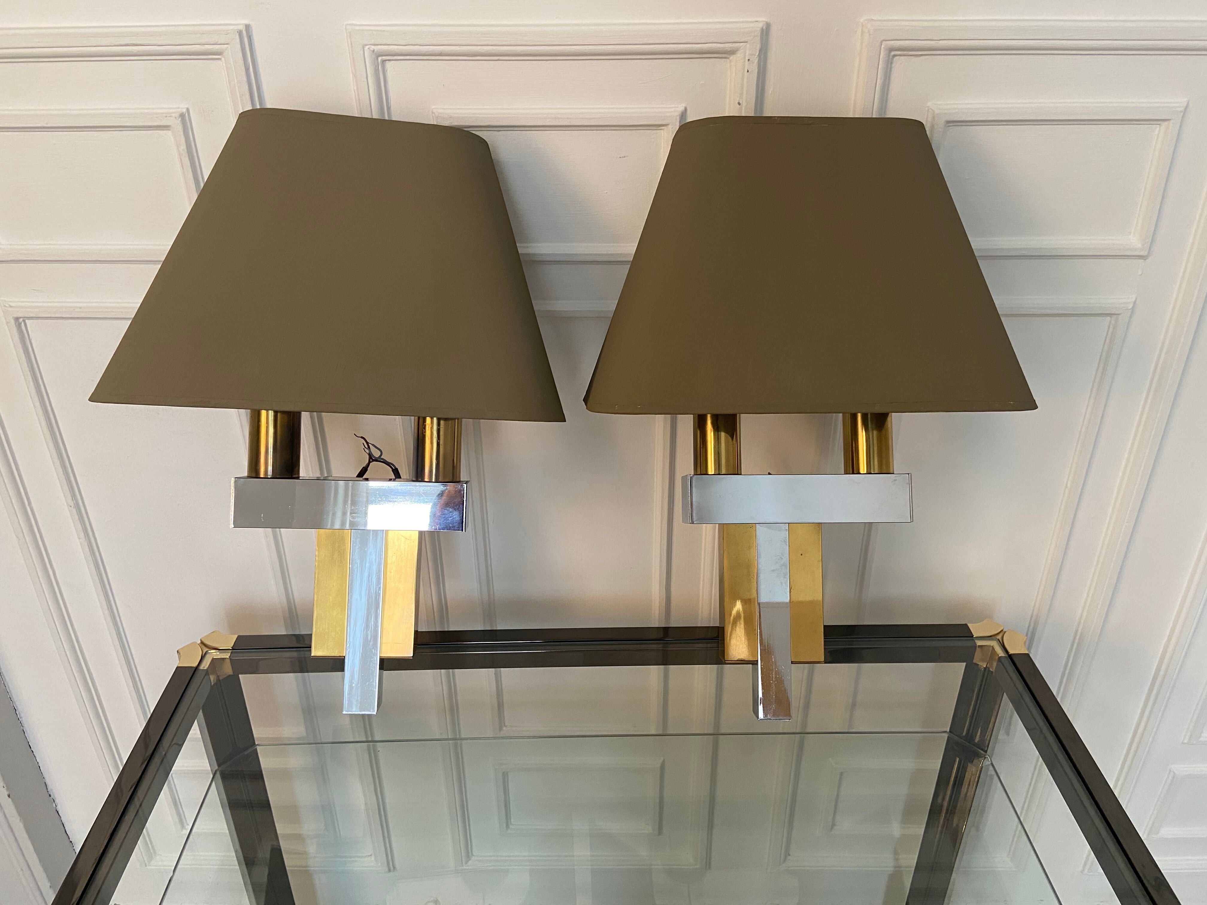 Pair of chrome and brass sconces, Italy, 1970s
